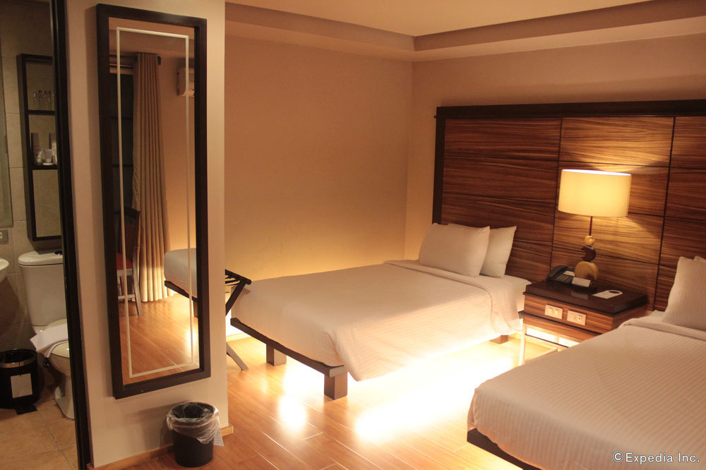 קואזון סיטי Soleste Suites מראה חיצוני תמונה