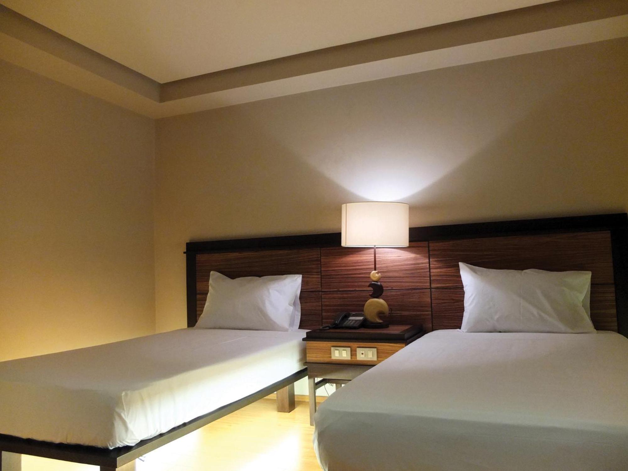 קואזון סיטי Soleste Suites מראה חיצוני תמונה