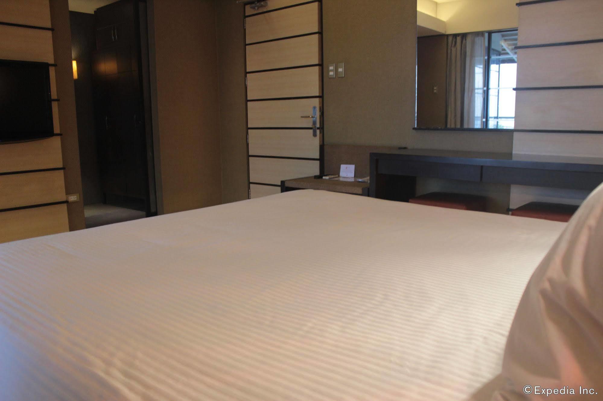 קואזון סיטי Soleste Suites מראה חיצוני תמונה