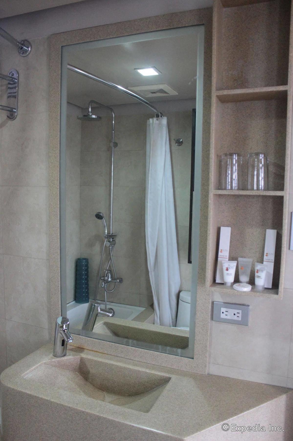 קואזון סיטי Soleste Suites מראה חיצוני תמונה
