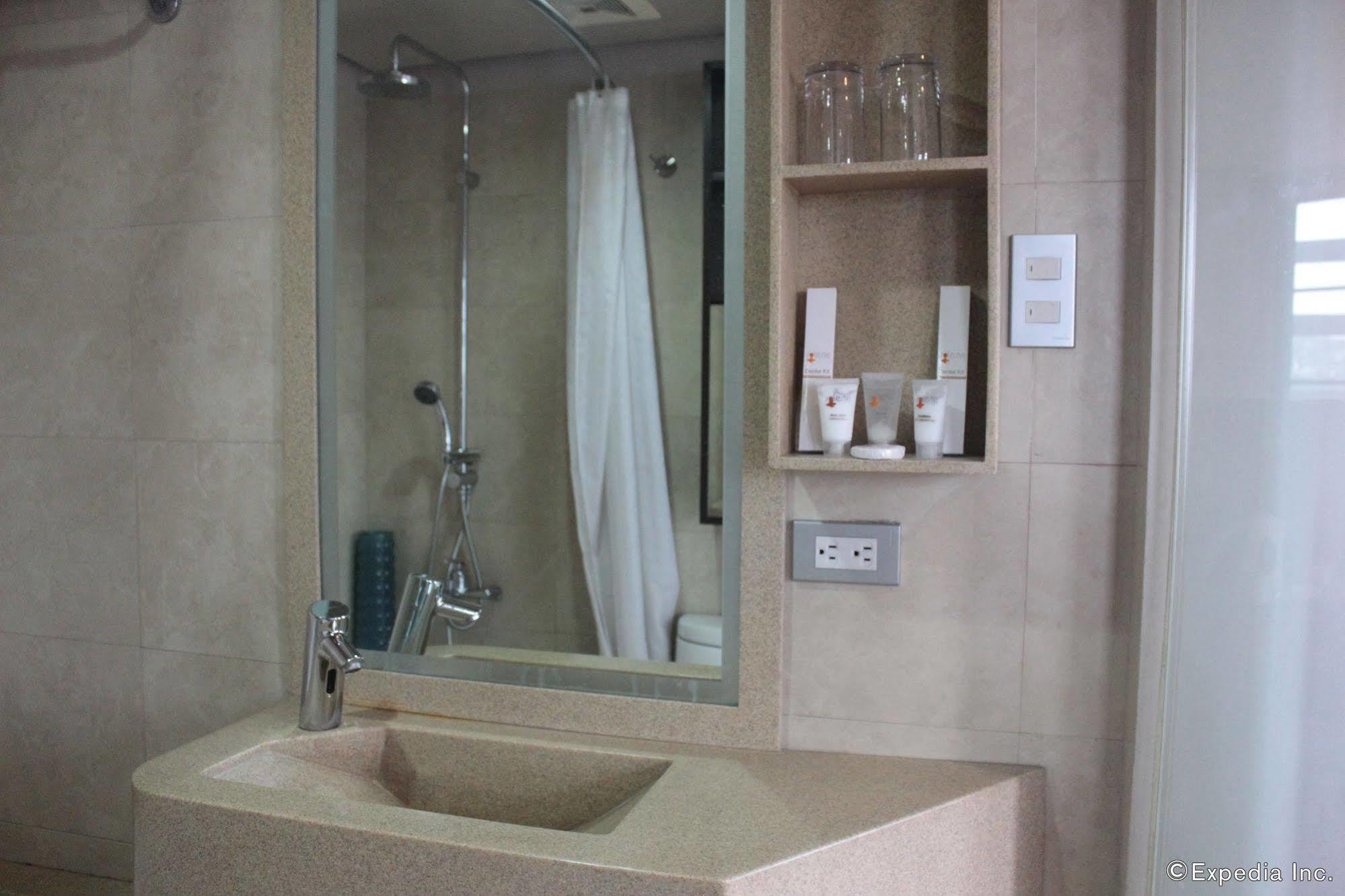 קואזון סיטי Soleste Suites מראה חיצוני תמונה